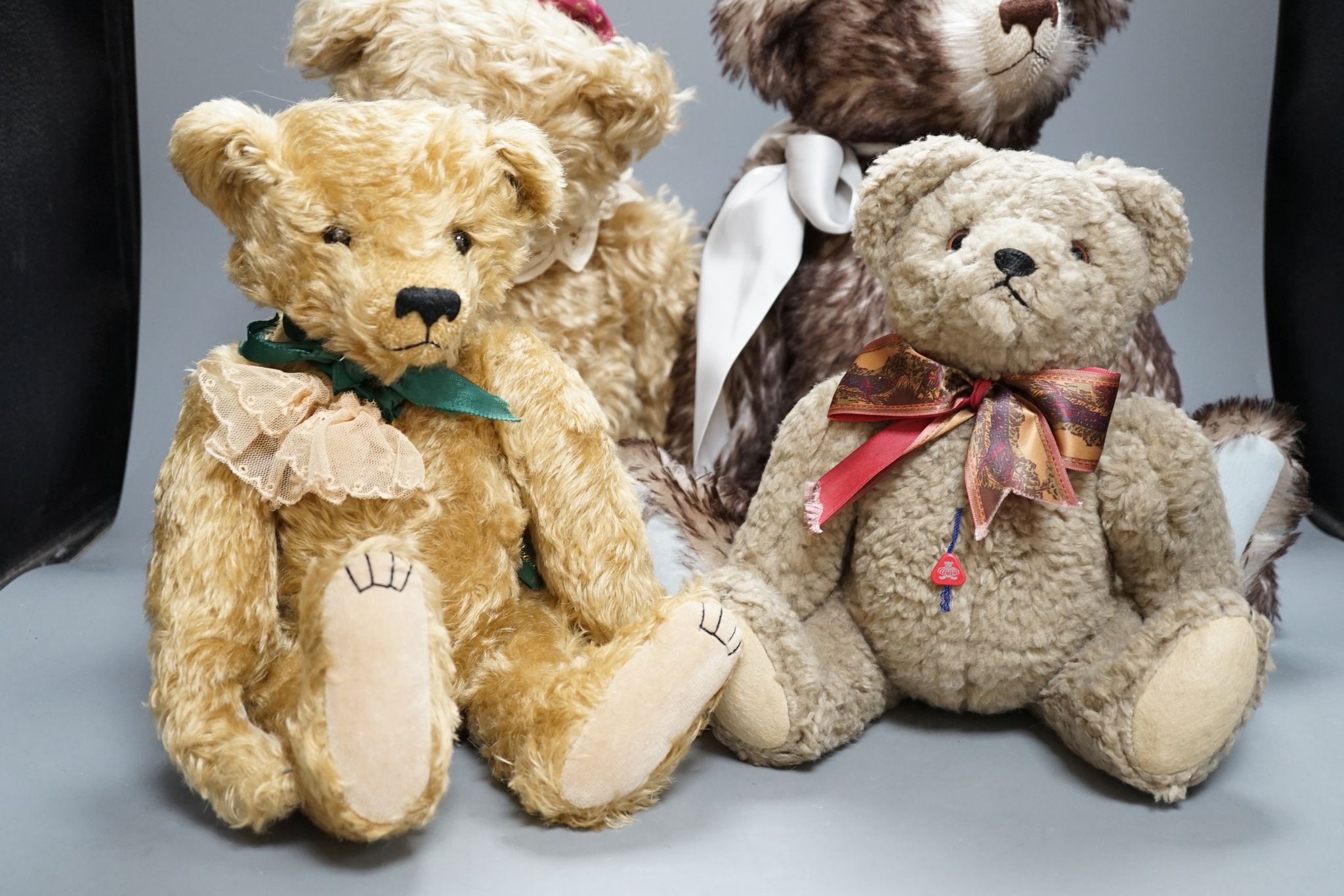 Four Pam Howells bears and one Clements bear